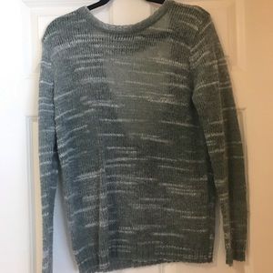 Green sweater with cutout in the back